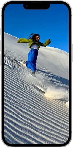 Fiori colorati sul display Super Retina XDR di iPhone 16e